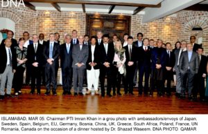 ISLAMABAD, MAR 05: Chairman PTI Imran Khan in a grou photo with ambassadors/envoys of Japan, Sweden, Spain, Belgium, EU, Germany, Bosnia, China, UK, Greece, South Africa, Poland, France, UN Romania, Canada on the occasion of a dinner hosted by Dr. Shazad Waseem. DNA PHOTO QAMAR