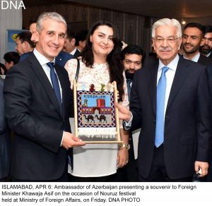 ISLAMABAD, APR 6: Ambassador of Azerbaijan presenting a souvenir to Foreign Minister Khawaja Asif on the occasion of Nouruz festival held at Ministry of Foreign Affairs, on Friday. DNA PHOTO