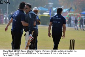 ISLAMABAD, DEC 01: Fawad Chauhdry Federal Information Minister and others in action in a friendly cricket match between PCB XI and Parliamentarians XI held to raise funds for Dams. DNA PHOTO