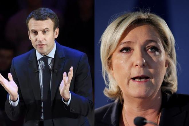 France's Macron appears set for Elysee in runoff with Le Pen