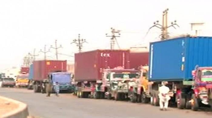 KARACHI: The goods transporters’ strike continues on the ninth day on Tuesday (today). It is feared that there is no space available at the port to accommodate more containers. The Karachi International Container Terminal stands full of the goods transporters are refusing to transport from the ports to the markets. If the strike continues, people in the country may be faced with a shortage of food items. To add to this, the dispatching of orders as per the schedule is being hindered which is affecting the export of goods also. The imported raw material also lies in containers at the ports which is not being transported to factories, inflicting losses worth billions for manufacturers. “Goods in thousands of containers are in factories, as the capacity of warehouses has been exhausted,” said an exporter, adding irrevocable damage could be caused if the issue is not resolved on an immediate basis. Experts from across the country worth Rs48 billion are said to have been halted due to the strike, with businessmen facing losses worth millions every day. On Saturday, the Sindh High Court banned the entry of heavy traffic in the port city which is persisting. Transporters have entered into a strike to protest against the ban disallowing entry of heavy vehicles into the city. Traders, industrialists, and manufacturers have all severely criticised the strikers for causing a severe bottleneck in the supply of basic necessities and other imported goods that sit idle in the containers on the port, which, in turn, have resulted in export consignments being unable to get loaded and dispatched.