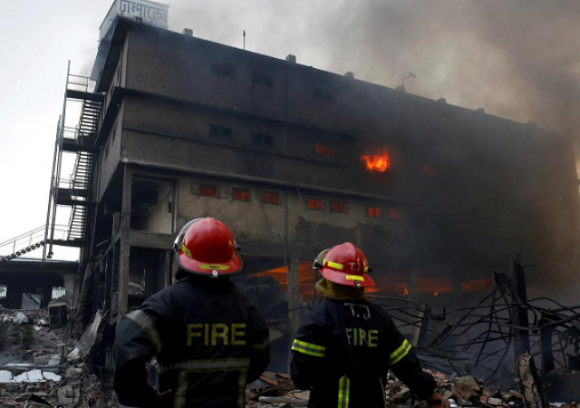 Workers jump to their deaths as Dhaka office block fire kills seven