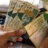 Rupee continues to sink, closes at 200.14 against US dollar in interbank market