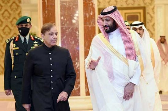 ISLAMABAD: Prime Minister Shehbaz Sharif has extended felicitation to the government and people of Saudi Arabia as the Kingdom celebrated its 94th National Day on Monday, marking the unification of the country by the late King Abdul Aziz in 1932. In his message, the premier said, that under the leadership of Saudi King Salman bin Abdulaziz and Prince Mohammed bin Salman, the Kingdom had emerged as a great country of the 21st century. Calling Saudi Arabia’s Vision 2030 a role model for the world, PM Shehbaz said the Kingdom was playing a leading role in the developing world in business, technology, economy and other fields. “Pakistan and Saudi Arabia enjoyed historic relations based on religious and cultural values and both countries supported each other through tough times,” he said. The prime minister added that the entire Pakistani nation was grateful for Saudi Arabia’s support in the recent stabilisation of Pakistan’s economy and expressed the hope that both countries would continue to enjoy cordial ties in the future as well. Meanwhile, Federal Interior Minister Mohsin Naqvi visited the Saudi Embassy to mark the special occasion in the diplomatic enclave. He was received by the Ambassador of Saudi Arabia Nawaf bin Said Ahmed Al-Maliki on his arrival. Federal Minister for Interior Mohsin Naqvi in a meeting with Ambassador of Saudi Arabia Nawaf Bin Said Ahmed Al-Maliki in Islamabad on September 23, 2024. — PID Federal Minister for Interior Mohsin Naqvi in a meeting with Ambassador of Saudi Arabia Nawaf Bin Said Ahmed Al-Maliki in Islamabad on September 23, 2024. — PID The interior minister congratulated Ambassador Al-Maliki on Saudi Arabia’s National Day and expressed good wishes for the Saudi Royal Family and the people of Saudi Arabia. He thanked the Saudi government and ambassador for their cooperation during difficult times, saying, “Saudi Arabia has always stood by Pakistan, whether during floods, earthquakes, economic or other challenges. Their support has been unparalleled.” Naqvi emphasised that every Muslim holds Saudi Arabia in special esteem. He said that Saudi Arabia has consistently supported Pakistan through thick and thin, and every Pakistani takes pride in our historic friendship. Saudi Ambassador said that Saudi Arabia highly values its relations with Pakistan as “it is our brotherly country”.