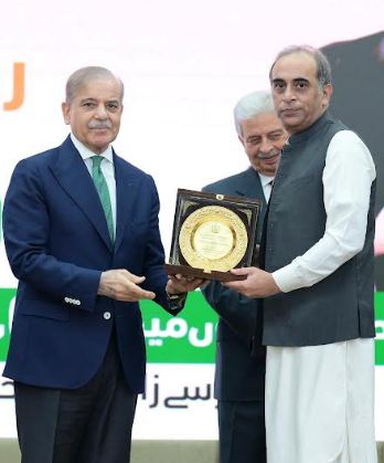 PM Shehbaz honors Mubashir Hasan for Ramzan relief services
