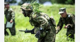 Beijing warns Japan's 'new militarism' poses threat to global peace