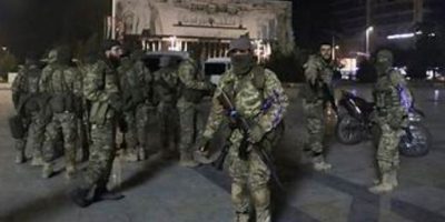 Syrian army says swept Aleppo district after clashes with Kurdish fighters