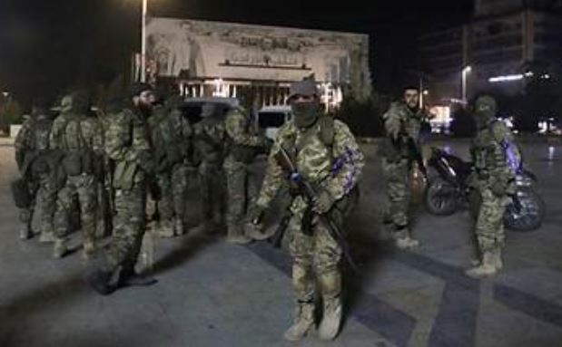 Syrian army says swept Aleppo district after clashes with Kurdish fighters