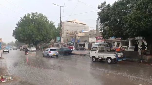 Weather turns pleasant as parts of Karachi receive hail, rain