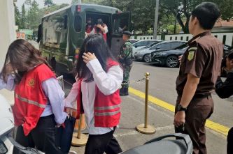 Indonesia charges 19 over baby trafficking