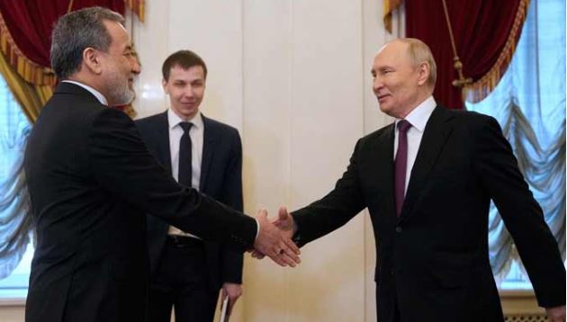 In meeting with Iranian FM, Putin pledges support for Iran