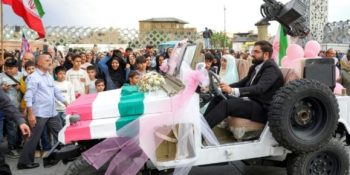 Iran stages mass weddings for couples ready for war ‘sacrifice’