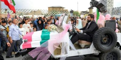 Iran stages mass weddings for couples ready for war ‘sacrifice’