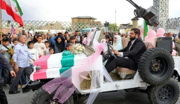 Iran stages mass weddings for couples ready for war ‘sacrifice’