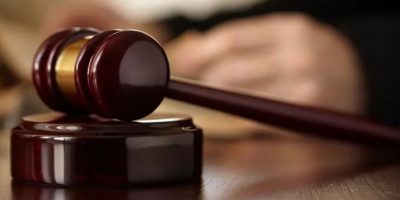 Federal judge bars Trump from implementing proof of citizenship requirement to vote