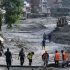 Rescuers dig into tunnel as missing toll from Nepal, China flood tops 3,000