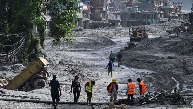 Rescuers dig into tunnel as missing toll from Nepal, China flood tops 3,000