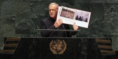 Iran's president vows Tehran will never "bend at the knee."
