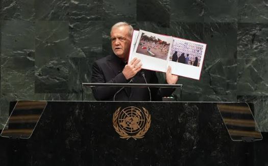 Iran's president vows Tehran will never "bend at the knee."