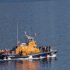 Twelve migrants drown as boats capsize off Greek islands